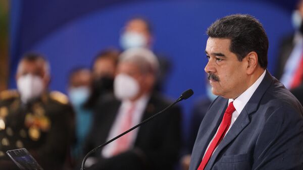 Handout picture released by the Venezuelan presidency showing Venezuelan President Nicolas Maduro, speaking during the Bolivarian Alliance for the Peoples of America (ALBA) Summit at the Miraflores presidential palace in Caracas, on June 24, 2021. - Sputnik International