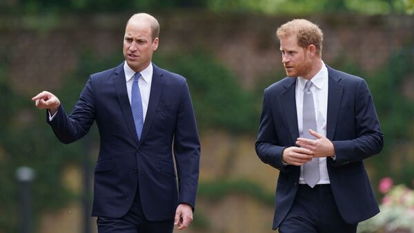 Britain's Prince William, The Duke of Cambridge, and Prince Harry, Duke of Sussex, attend the unveiling of a statue they commissioned of their mother Diana, Princess of Wales, in the Sunken Garden at Kensington Palace, London, Britain July 1, 2021 - Sputnik International