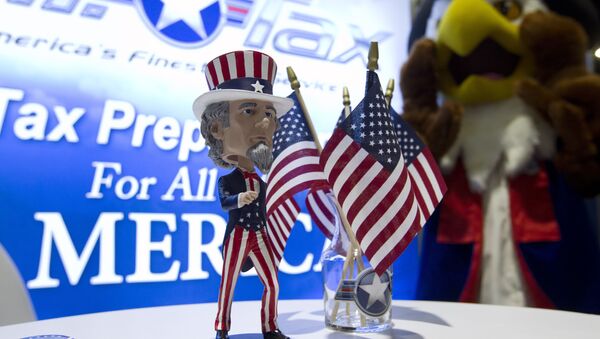 An Uncle Sam bubblehead decorates a booth during the Conservative Political Action Conference, CPAC 2019, in Oxon Hill, Md., Friday, March 1, 2019. - Sputnik International