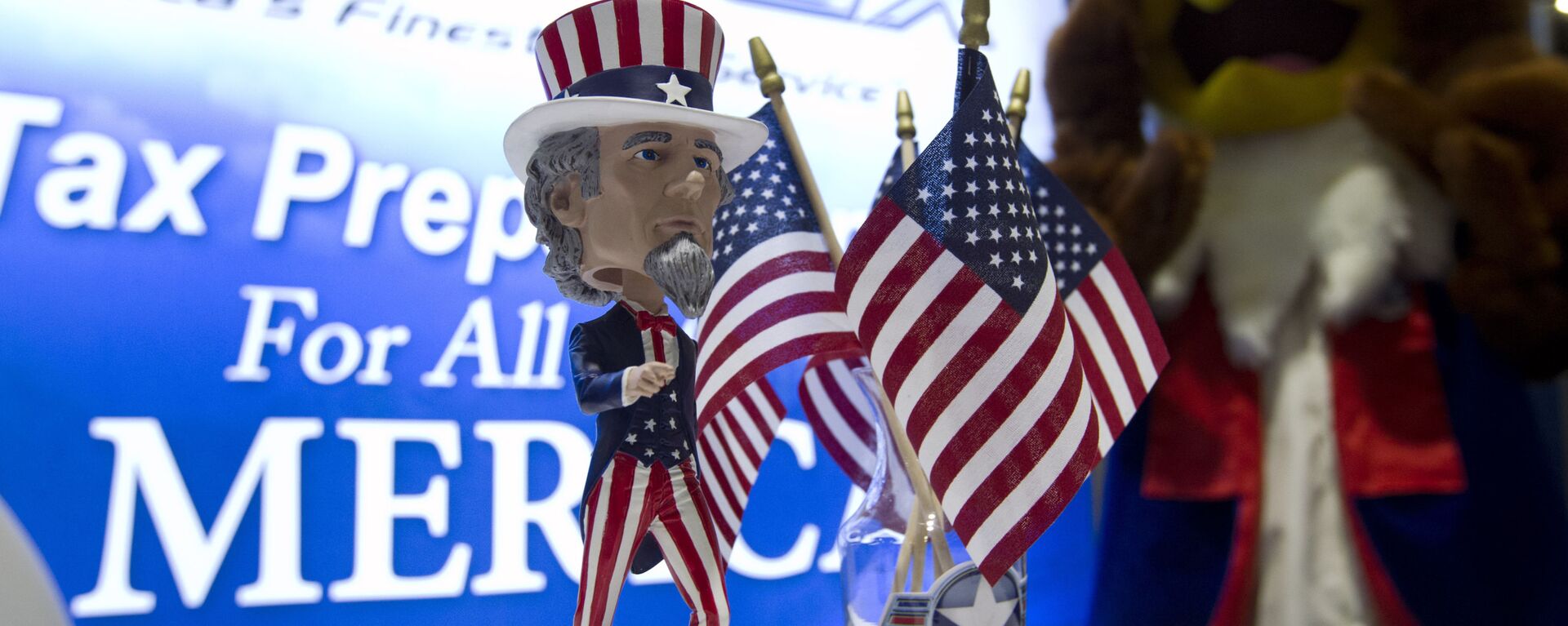 An Uncle Sam bubblehead decorates a booth during the Conservative Political Action Conference, CPAC 2019, in Oxon Hill, Md., Friday, March 1, 2019. - Sputnik International, 1920, 23.03.2024