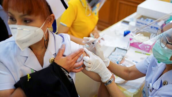 FILE PHOTO: A health worker receives the Sinovac coronavirus disease (COVID-19) vaccine at the Samut Sakhon hospital in Samut Sakhon province - Sputnik International