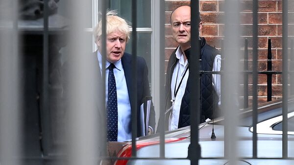 Britain's Prime Minister Boris Johnson (L) and his special advisor Dominic Cummings leave from the rear of Downing Street in central London on September 3, 2019, before heading to the Houses of Parliament - Sputnik International