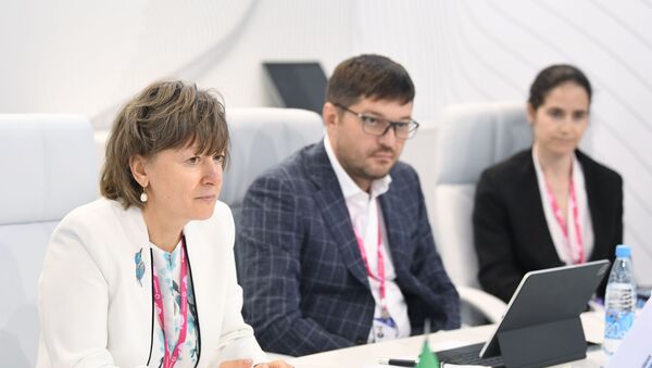 Russian Export Centre CEO Veronika Nikishina and Italian Minister of Economic Development Giancarlo Giorgetti. - Sputnik International