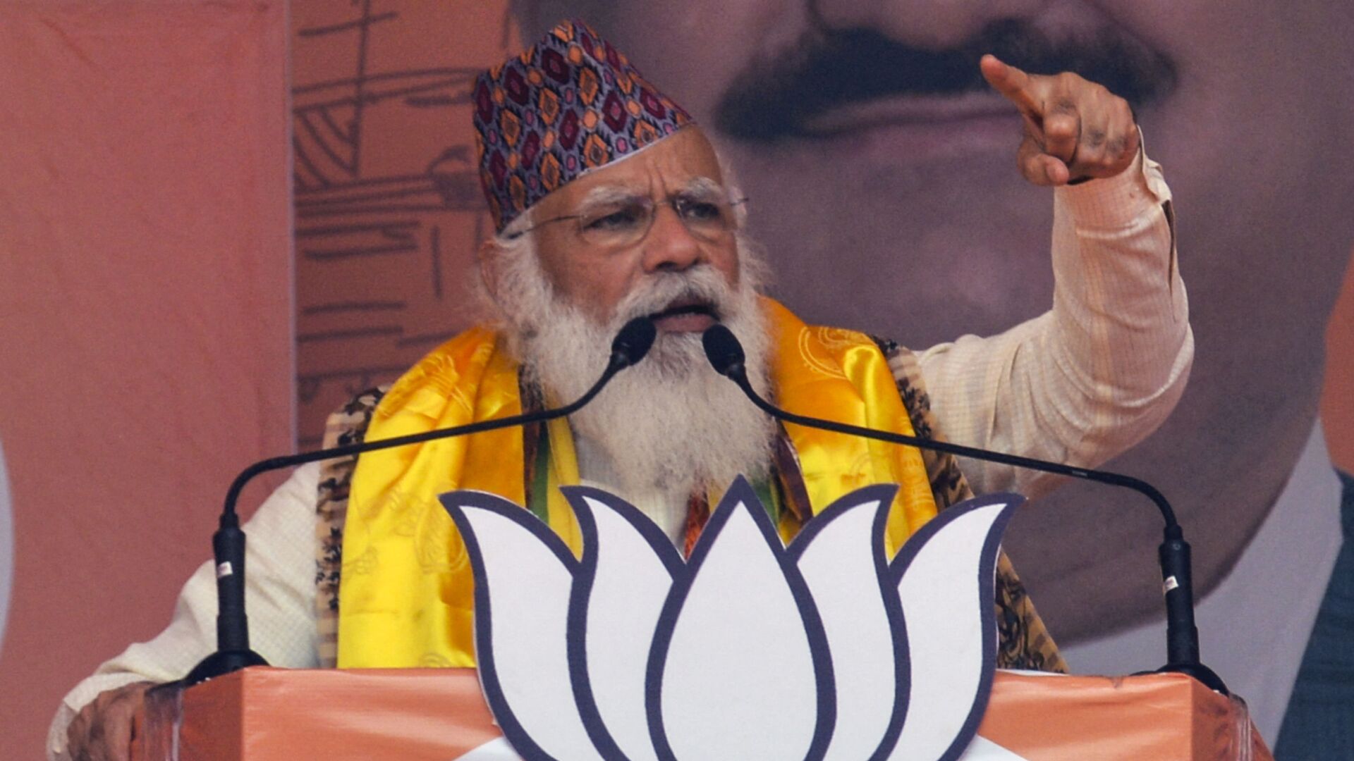 Indian Prime Minister Narendra Modi gestures as he speaks at a rally during the ongoing Phase 4 of West Bengal's assembly election, at Kawakhali on the outskirts of Siliguri on 10 April 2021 - Sputnik International, 1920, 27.08.2021