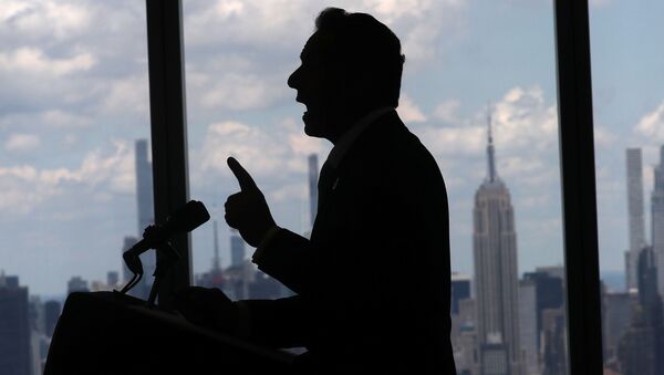 New York Governor Andrew Cuomo speaks with the skyline of Manhattan behind him from the One World Trade Center Tower while making an announcement in New York City, New York, U.S., June 15, 2021. - Sputnik International