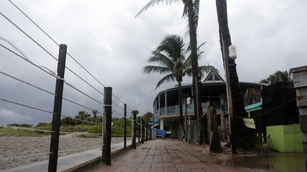 Dark clouds from Tropical Storm Elsa loom over Venice Fishing Pier at Brohard Park at Venice Beach, Florida, U.S. July 6, 2021. - Sputnik International
