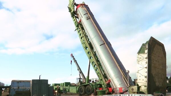 An intercontinental ballistic missile of the Avangard strategic missile system being installed in a silo in the Orenburg region. - Sputnik International