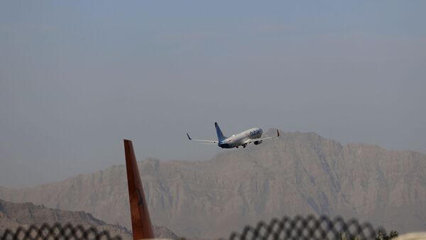 A fly Dubai plane departs Hamid Karzai International Airport in Kabul, Afghanistan, Sunday, July 4, 2021. - Sputnik International