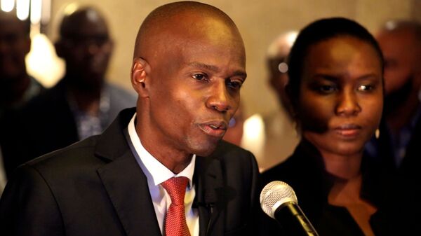 FILE PHOTO: Jovenel Moise addresses the media next to his wife Martine after winning the 2016 presidential election, in Port-au-Prince, Haiti. Picture taken November 28, 2016 - Sputnik International