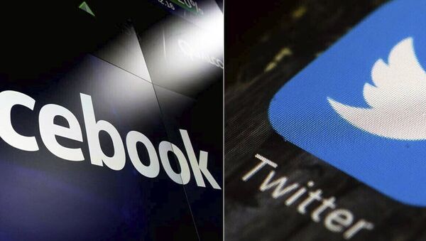 This combination of photos shows logos for social media platforms Facebook and Twitter. Shares of social media and other tech companies slid Monday, Jan. 11, 2021 amid fallout the siege on the U.S. Capitol by supporters of President Donald Trump's supporters. (AP Photo/File) - Sputnik International