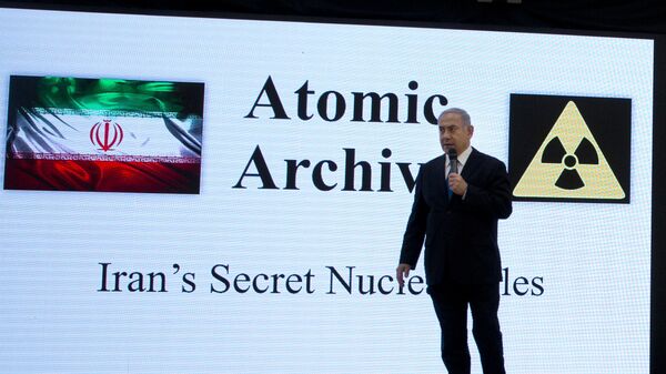 Israeli Prime Minister Benjamin Netanyahu presents material on Iranian nuclear weapons development during a press conference in Tel Aviv, Monday, April 30 2018 - Sputnik International
