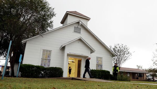 FILE - In this Nov. 12, 2017, file photo, a man walks out of the memorial for the victims of a shooting at Sutherland Springs First Baptist Church in Sutherland Springs, Texas. A judge will consolidate all federal lawsuits against the U.S. Air Force over the 2017 South Texas church shooting that killed more than two dozen worshippers. The gunman formerly was in the military. - Sputnik International