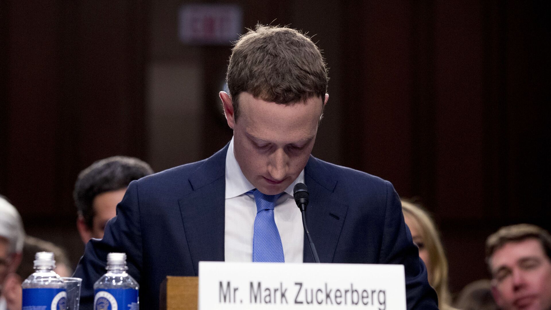 In this April 10, 2018, file photo Facebook CEO Mark Zuckerberg looks down as a break is called during his testimony before a joint hearing of the Commerce and Judiciary Committees on Capitol Hill in Washington. - Sputnik International, 1920, 06.10.2021
