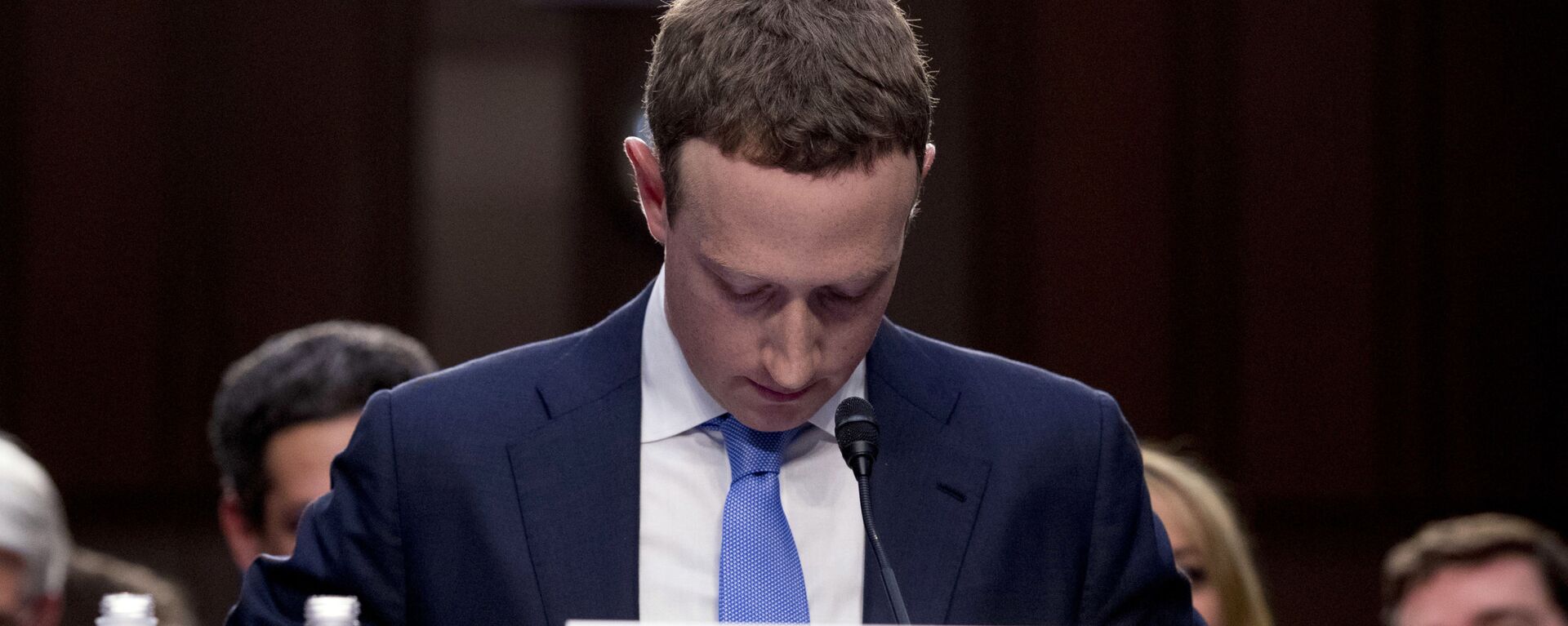 In this April 10, 2018, file photo Facebook CEO Mark Zuckerberg looks down as a break is called during his testimony before a joint hearing of the Commerce and Judiciary Committees on Capitol Hill in Washington. - Sputnik International, 1920, 06.02.2022