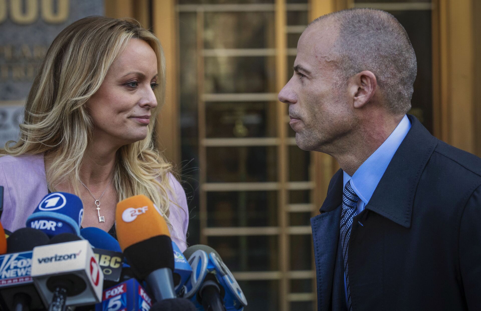 In this April 16, 2018, file photo, adult film actress Stormy Daniels, left, stands with her then lawyer, Michael Avenatti, during a press conference outside federal court in New York. A trial for Avenatti to face charges that he cheated ex-client Daniels out of proceeds from her book was delayed Friday, Jan. 8, 2021, until next year - Sputnik International, 1920, 07.09.2021