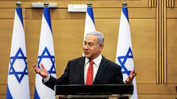 The leader of the Israeli opposition Benjamin Netanyahu speaks during a meeting with his party Likud in the Knesset, the Israeli Parliament, in Jerusalem on 14 June 2021.  - Sputnik International
