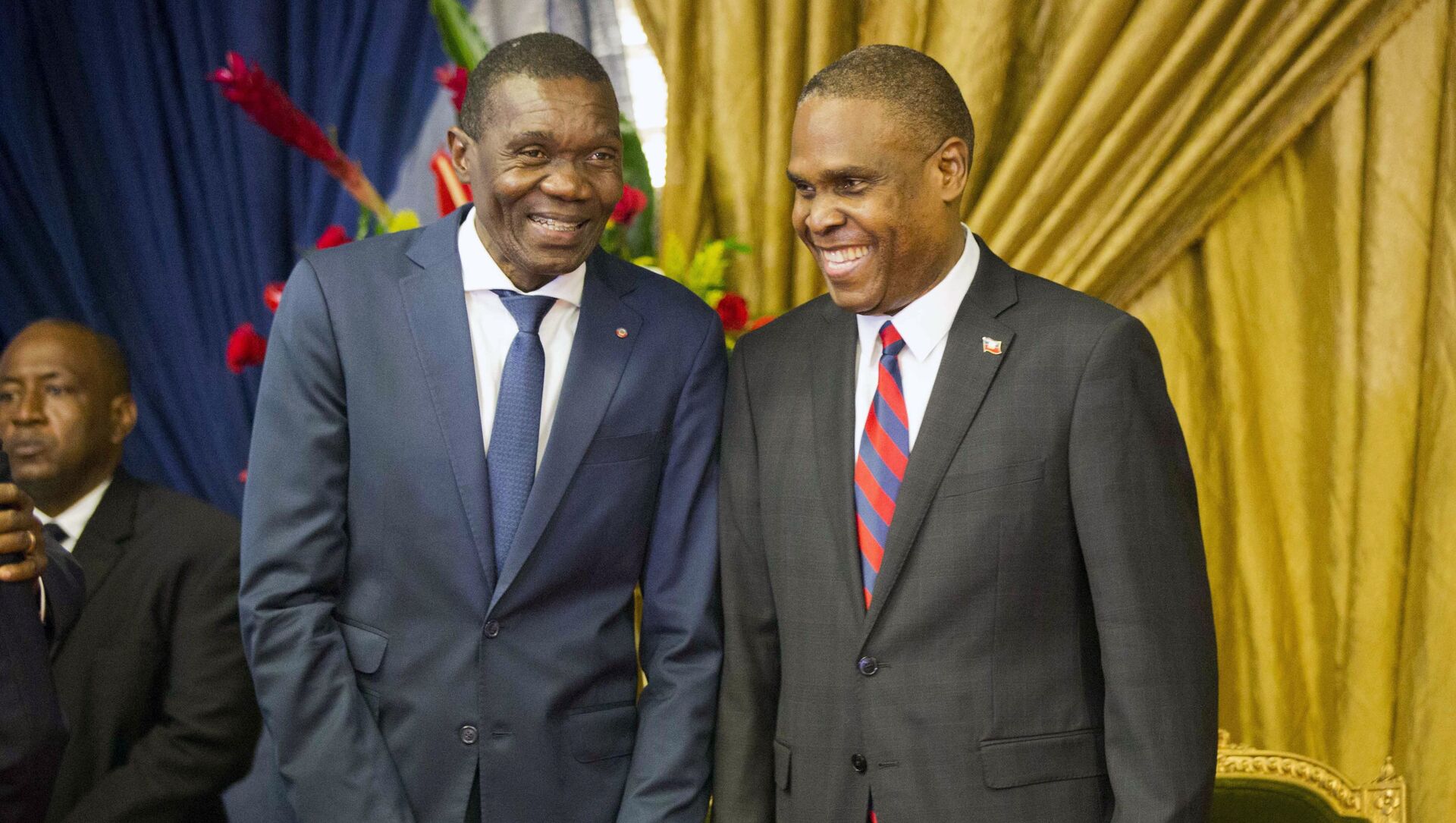 Haiti's new prime minister Jean-Henry Ceant, right, talks to Senate President Joseph Lambert during the nomination ceremony at the national Palace in Port-au-Prince, Haiti, Tuesday, Aug. 7, 2018.  - Sputnik International, 1920, 09.07.2021