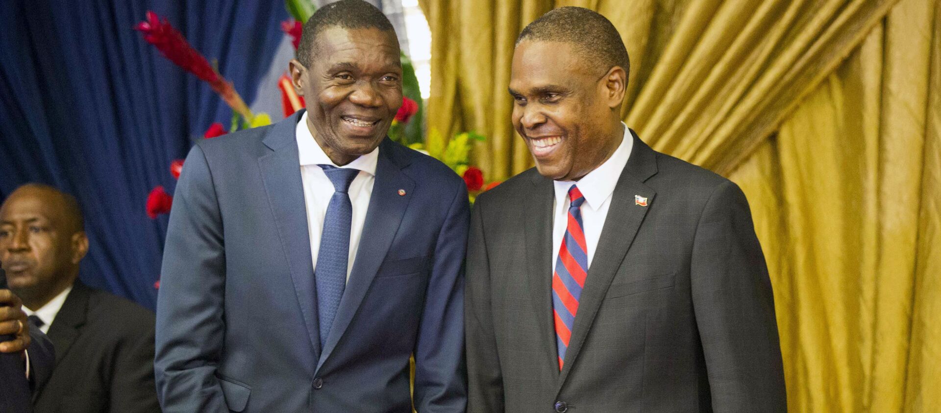 Haiti's new prime minister Jean-Henry Ceant, right, talks to Senate President Joseph Lambert during the nomination ceremony at the national Palace in Port-au-Prince, Haiti, Tuesday, Aug. 7, 2018.  - Sputnik International, 1920, 09.07.2021