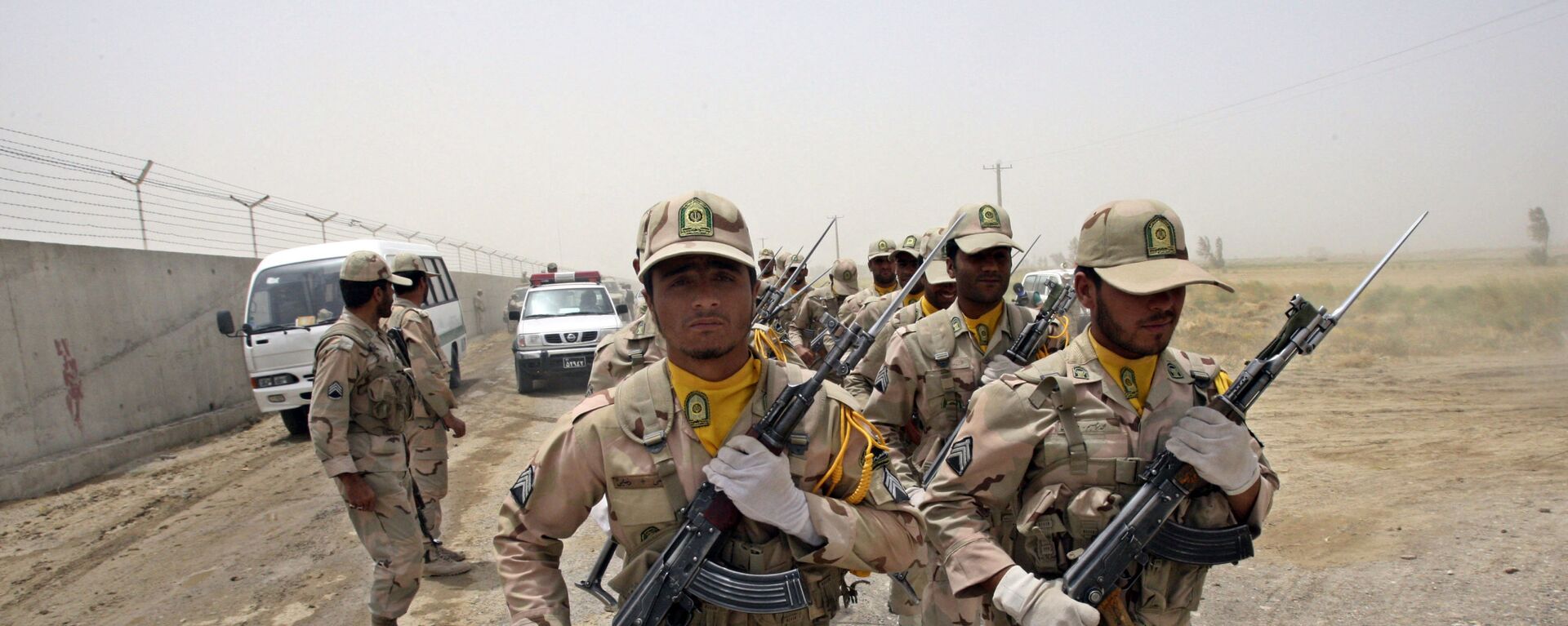 In this Tuesday, July 19, 2011 file photo, a group of Iranian border guards march at the eastern border of Iran shared with Pakistan and Afghanistan near Zabol, Sistan and Baluchestan Province, Iran.  - Sputnik International, 1920, 10.07.2021