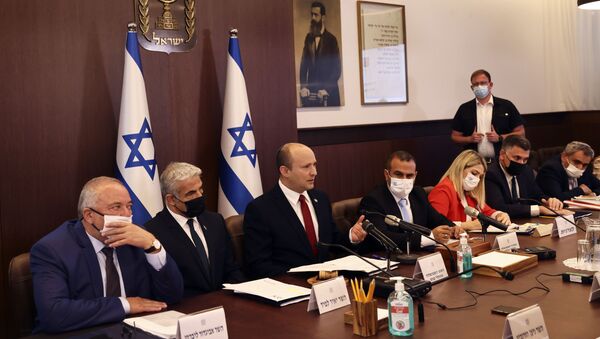 Israeli Prime Minister Naftali Bennett, center, convenes the weekly cabinet meeting, in Jerusalem, Sunday, July 11, 2021. - Sputnik International