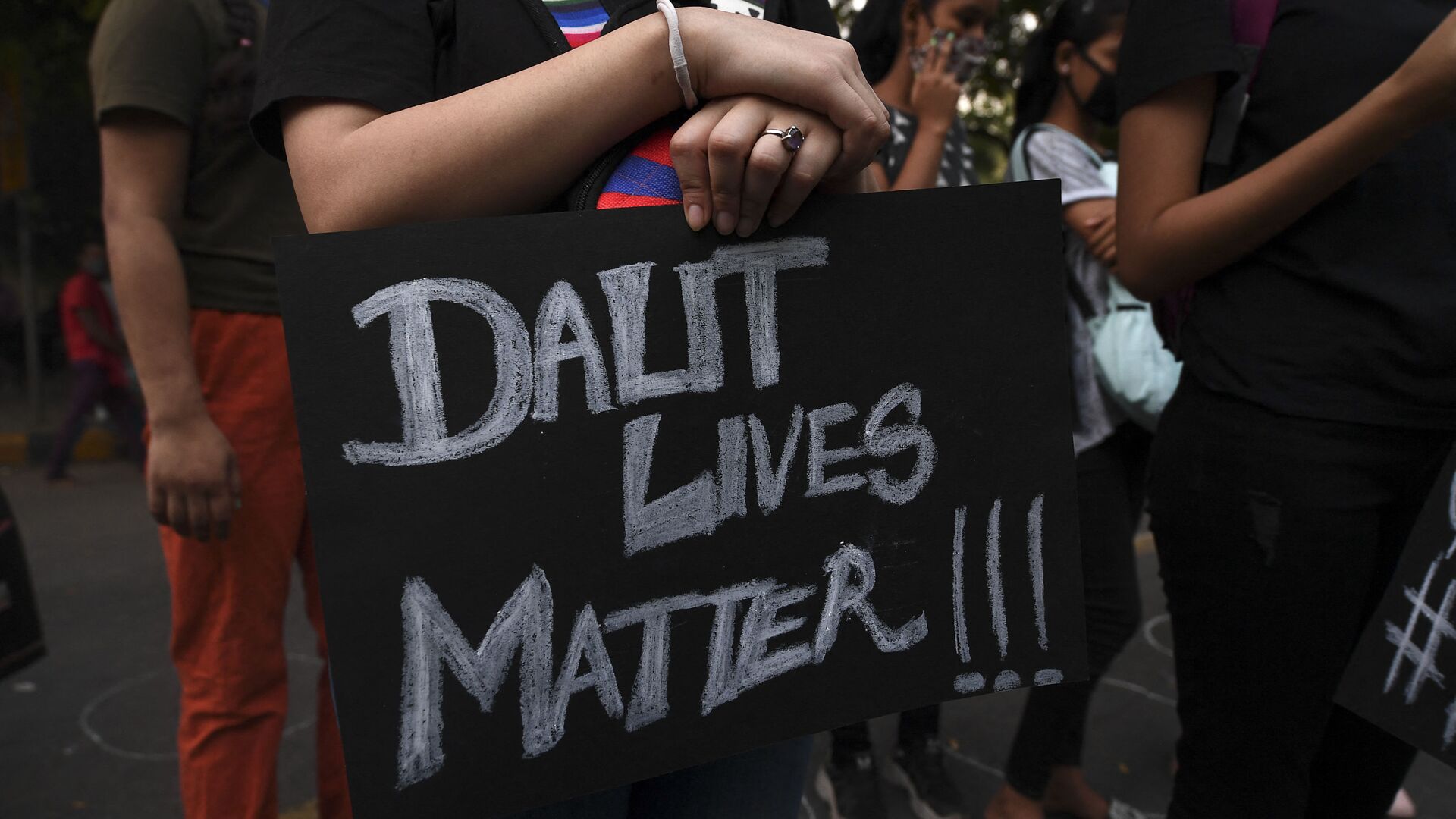 A demonstrator holds a placard reading 'Dalit Lives Matter' (File) - Sputnik International, 1920, 12.07.2021
