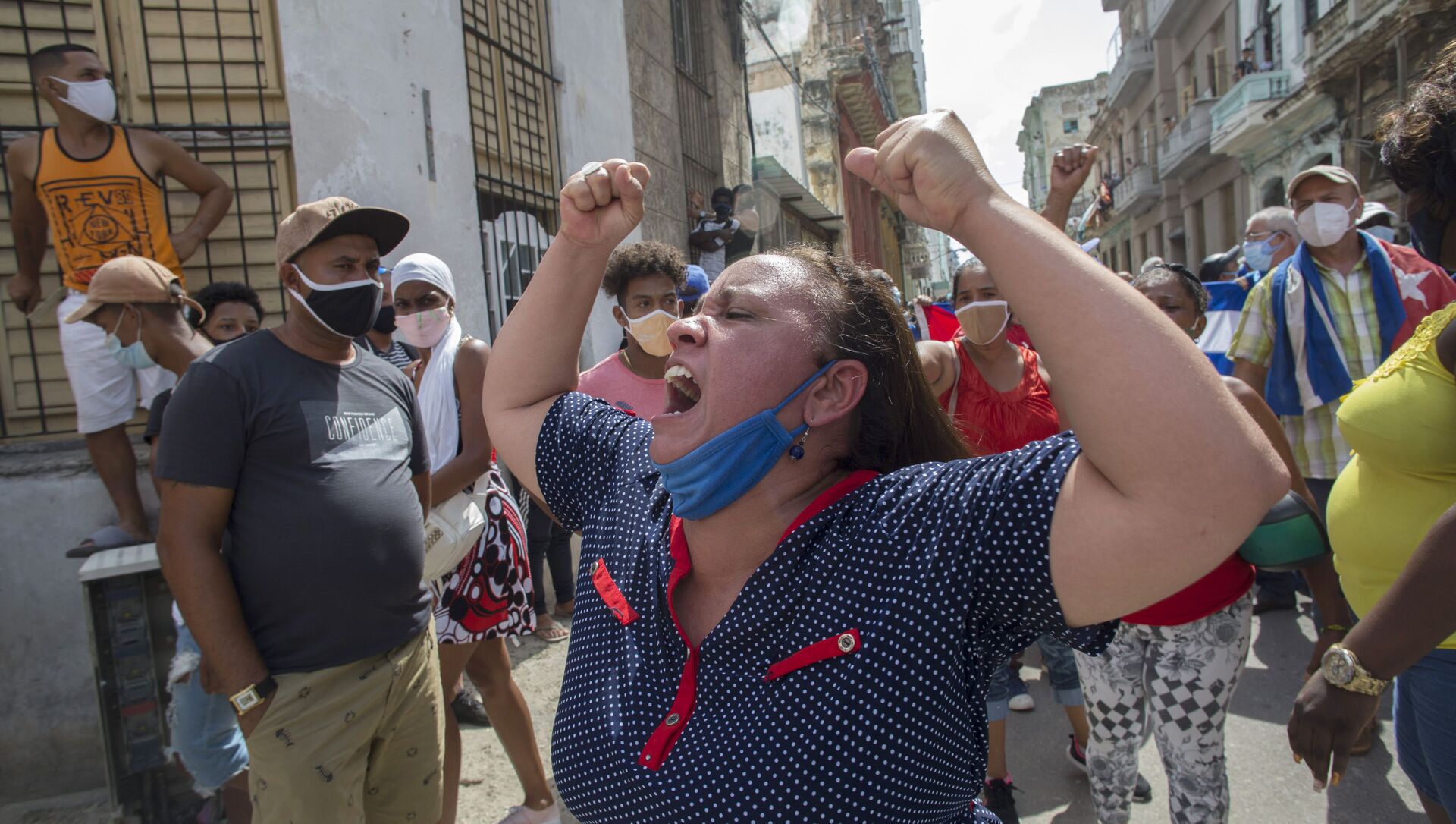 A woman shouts pro-government slogans as anti-government protesters march in Havana, Cuba, Sunday, July 11, 2021 - Sputnik International, 1920, 12.07.2021