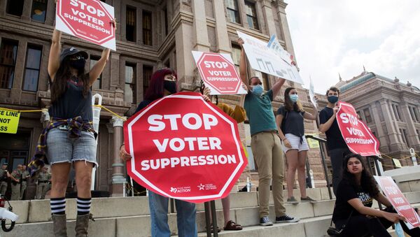 Voting rights activists gather during a protest against Texas legislators who are advancing a slew of new voting restrictions in Austin, Texas, U.S., May 8, 2021 - Sputnik International