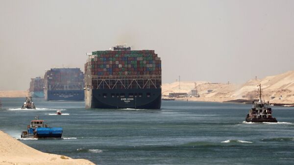 FILE PHOTO: Ever Given, one of the world's largest container ships, sets sail to leave through Suez Canal after the canal authority reached a settlement with the vessel's owner and insurers, in Ismailia, Egypt, July 7, 2021. - Sputnik International