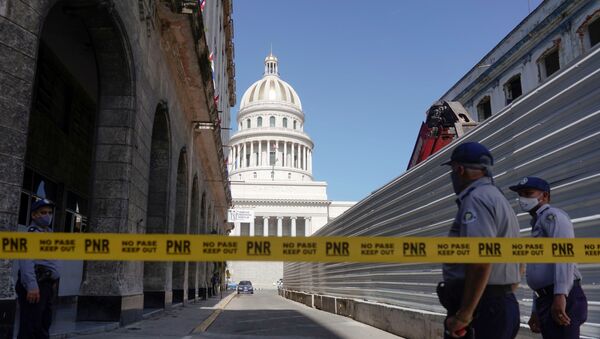 A police line is seen blocking a road leading to the National Capitol Building, in Havana, Cuba, July 12, 2021.  - Sputnik International