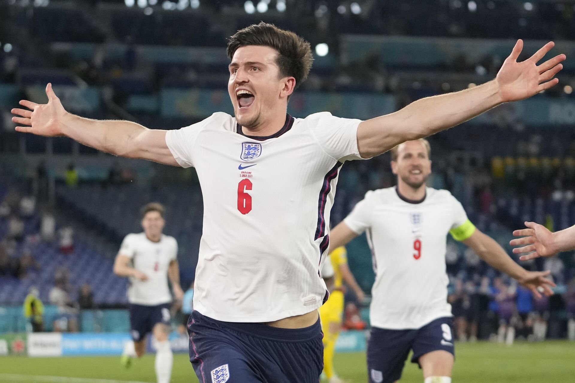 England's Harry Maguire celebrates after scoring his side's second goal during the Euro 2020 soccer championship quarterfinal match between Ukraine and England at the Olympic stadium in Rome at the Olympic stadium in Rome, Italy, Saturday, July 3, 2021 - Sputnik International, 1920, 07.09.2021