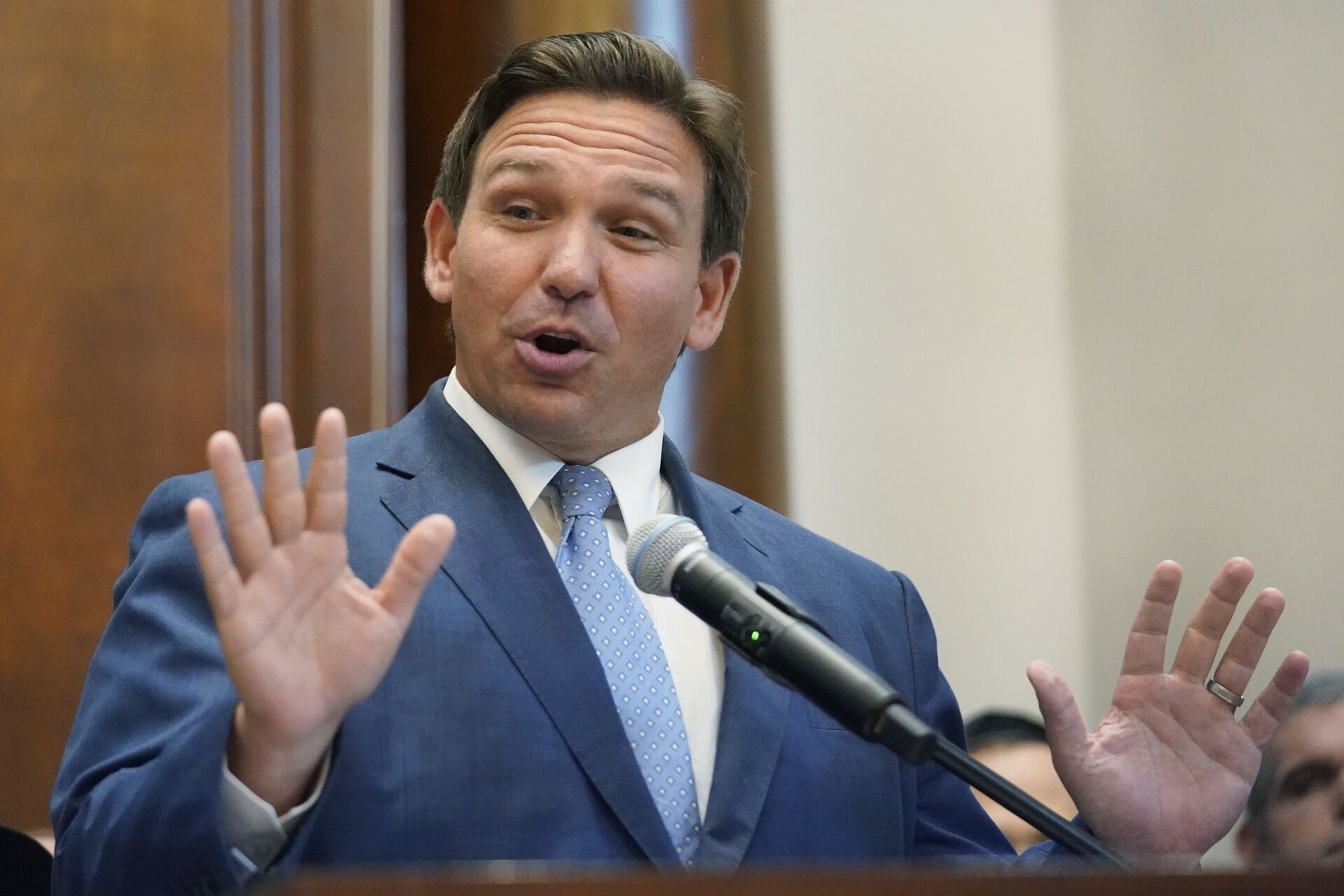 Florida Gov. Ron DeSantis gestures as he speaks, Monday, June 14, 2021, at the Shul of Bal Harbour, a Jewish community center in Surfside, Fla. DeSantis visited the South Florida temple to denounce anti-Semitism and stand with Israel, while signing a bill into law that would require public schools in his state to set aside moments of silence for children to meditate or pray - Sputnik International, 1920, 07.09.2021