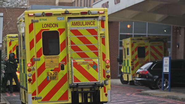 Ambulances are parked at the emergency arrival at Charing Cross hospital in London, Friday, Jan. 8, 2021 - Sputnik International