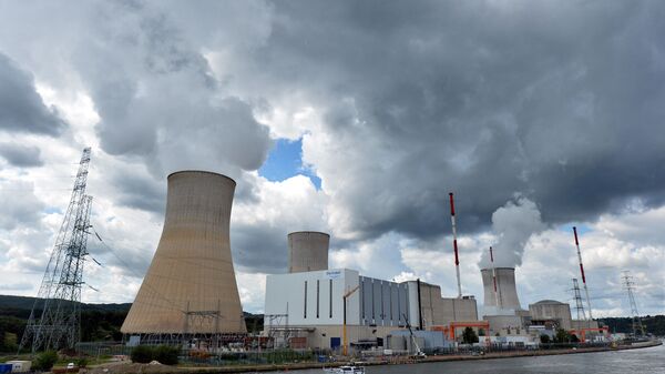 A photo taken on August 20, 2014 shows a nuclear power plant, in Tihange, Belgium. Reactor number 3 of the Doel nuclear plant near Antwerp and reactor number 2 of the Tihange plant have been stopped since March 25. They had already been stopped from June 2012 to June 2013 after thousands of microcracks had been discovered in their tanks. Reactors are not scheduled to restart until the Fall but could restart only in the Spring, if at all, reports the French-speaking Belgian press. - Sputnik International