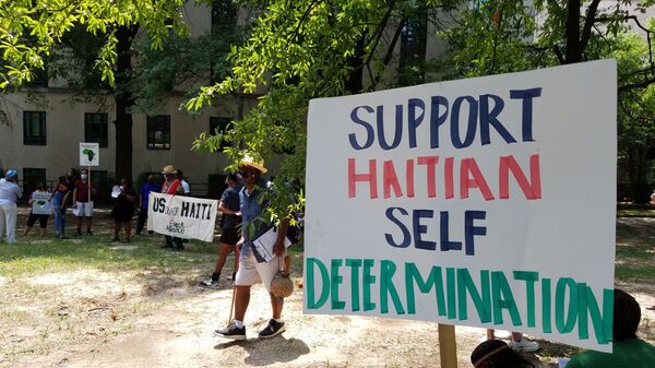 Activists rally outside the US State Department against US involvement in Haiti, including the potential deployment of US troops after the assassination of Haitian President Jovenel Moise - Sputnik International