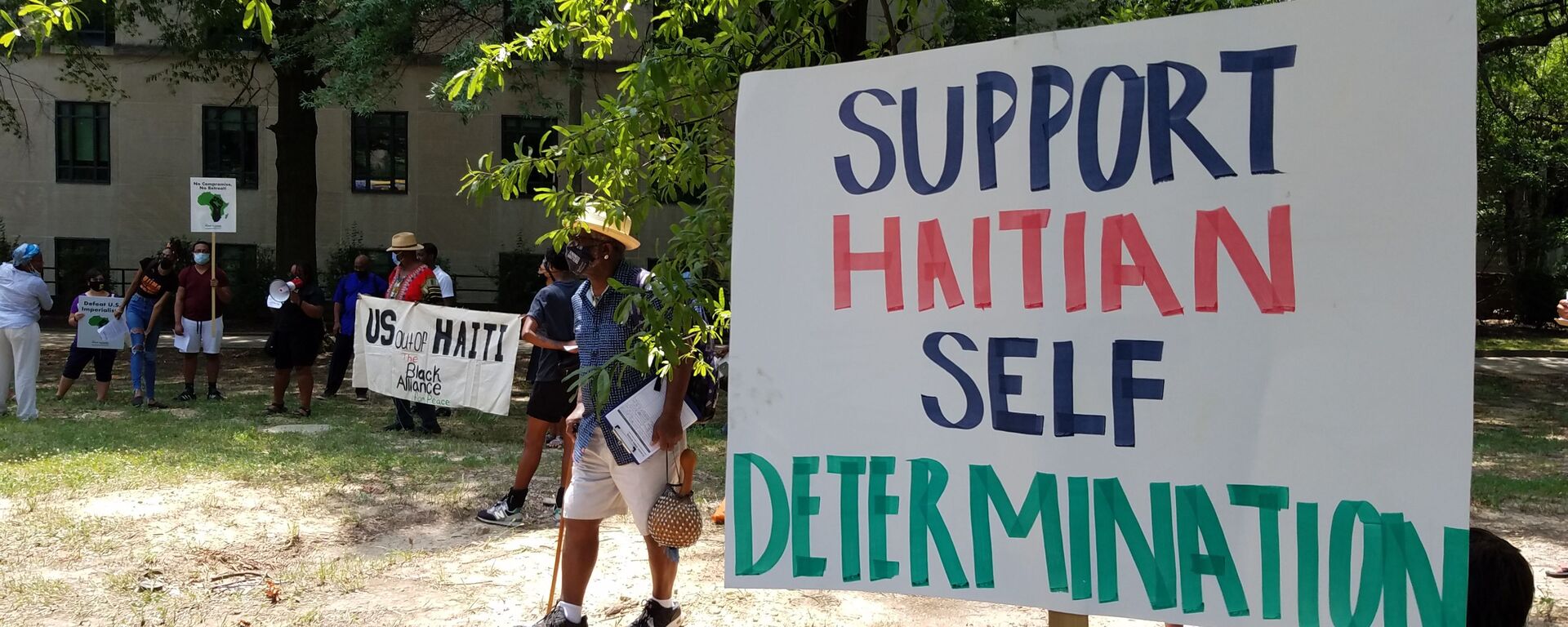 Activists rally outside the US State Department against US involvement in Haiti, including the potential deployment of US troops after the assassination of Haitian President Jovenel Moise - Sputnik International, 1920, 17.02.2023