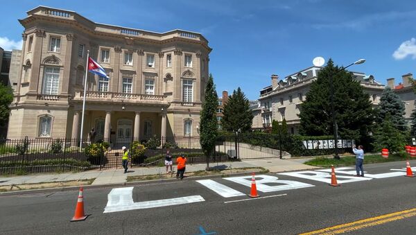 The message Cuba Libre or 'free Cuba', is seen painted in giant block lettering on the street directly in front of the Cuban embassy in this frame grab from video shot in Washington, U.S., July 16, 2021 - Sputnik International