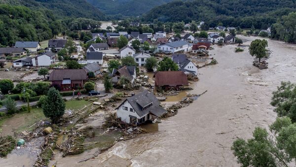 Damaged houses are seen at the Ahr river in Insul, western Germany, Thursday, July 15, 2021. Due to heavy rain falls the Ahr river dramatically went over the banks the evening before. People have died and dozens of people are missing in Germany after heavy flooding turned streams and streets into raging torrents, sweeping away cars and causing some buildings to collapse. - Sputnik International