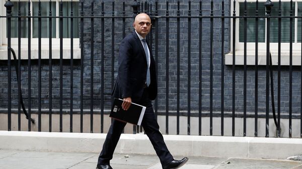 Britain's Health Secretary Sajid Javid walks on Downing Street in London, Britain, July 14, 2021 - Sputnik International