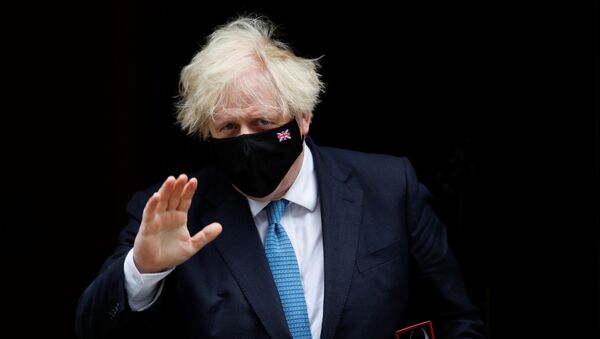 Britain's Prime Minister Boris Johnson walks on Downing Street in London, Britain, 14 July 2021 - Sputnik International
