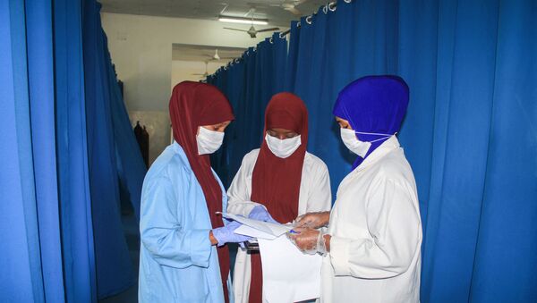 Nurses work for patients who are infected with the COVID-19 coronavirus in the recovery ward at Martini hospital in Mogadishu, Somalia, on July 29, 2020.  - Sputnik International