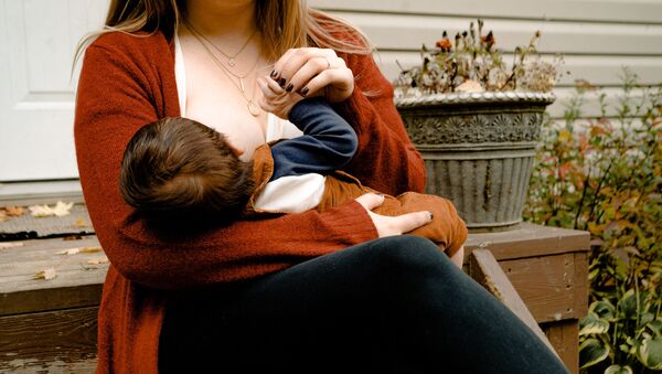 Photo Of Woman Breastfeeding Her Child - Sputnik International