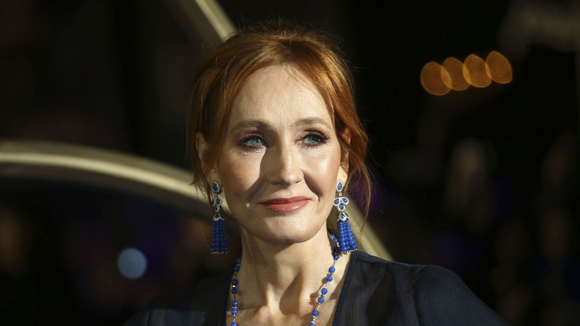 In this 13 November 2018 file photo, author J.K. Rowling poses for photographers upon her arrival at the premiere of the film 'Fantastic Beasts: The Crimes of Grindelwald', in London - Sputnik International, 1920, 20.07.2021