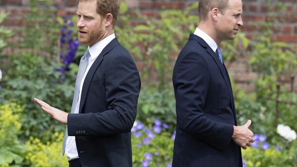 Prince Harry, left, and Prince William stand together during the unveiling of a statue they commissioned of their mother Princess Diana, on what woud have been her 60th birthday, in the Sunken Garden at Kensington Palace, London, Thursday July 1, 2021 - Sputnik International