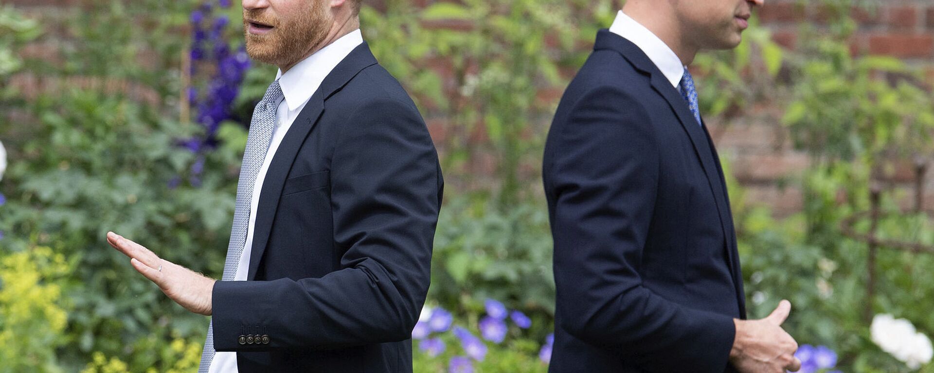 Prince Harry, left, and Prince William stand together during the unveiling of a statue they commissioned of their mother Princess Diana, on what woud have been her 60th birthday, in the Sunken Garden at Kensington Palace, London, Thursday July 1, 2021 - Sputnik International, 1920, 18.06.2022