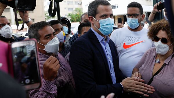 Venezuela's opposition figure Juan Guaido greets people, in Caracas, Venezuela on 12 July 2021.   - Sputnik International