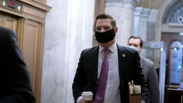 Rep. Eric Swalwell, D-Calif., arrives at the start of the fifth day of the second impeachment trial of former President Trump, Saturday, Feb. 13, 2021 at the Capitol in Washington. - Sputnik International
