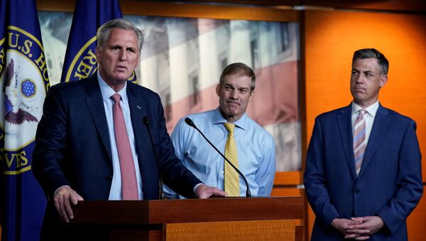 U.S. House Minority Leader Kevin McCarthy (R-CA) announces the withdrawal of his nominees to serve on the special committee probing the Jan. 6 attack on the Capitol, as two of the Republican nominees, Reps' Jim Jordan (R-OH) and Jim Banks (R-IN), standby during a news conference on Capitol Hill in Washington, U.S., July 21, 2021 - Sputnik International
