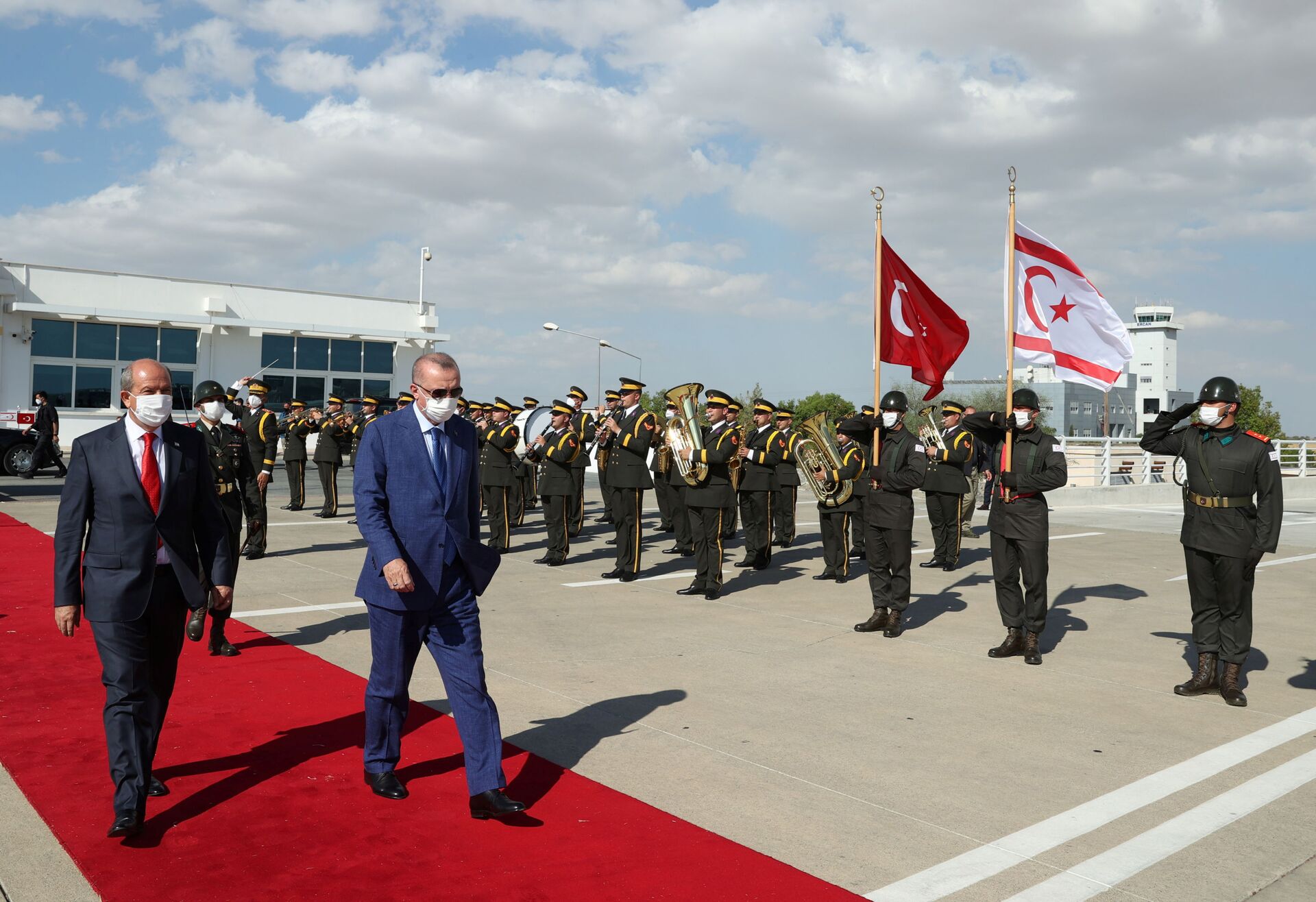 Turkish President Tayyip Erdogan reviews a guard of honour with Turkish Cypriot leader Ersin Tatar before he daparts from the Turkish Republic of Northern Cyprus, a breakway state recognized only by Turkey, in northern Nicosia, Cyprus July 20, 2021. - Sputnik International, 1920, 07.09.2021