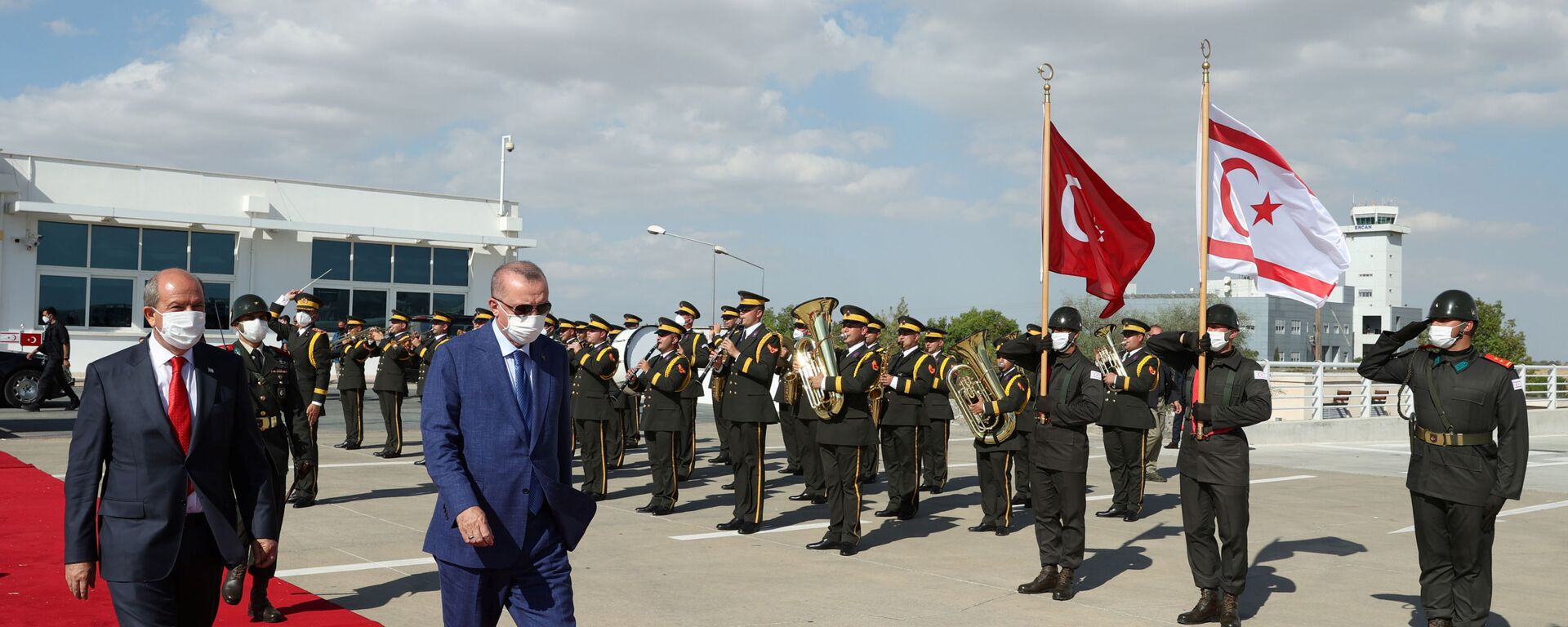 Turkish President Tayyip Erdogan reviews a guard of honour with Turkish Cypriot leader Ersin Tatar before he daparts from the Turkish Republic of Northern Cyprus, a breakway state recognized only by Turkey, in northern Nicosia, Cyprus July 20, 2021. - Sputnik International, 1920, 21.07.2021