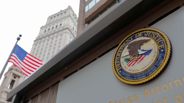 The seal of the United States Department of Justice is seen on the building exterior of the United States Attorney's Office of the Southern District of New York in Manhattan, New York City, U.S., August 17, 2020. - Sputnik International